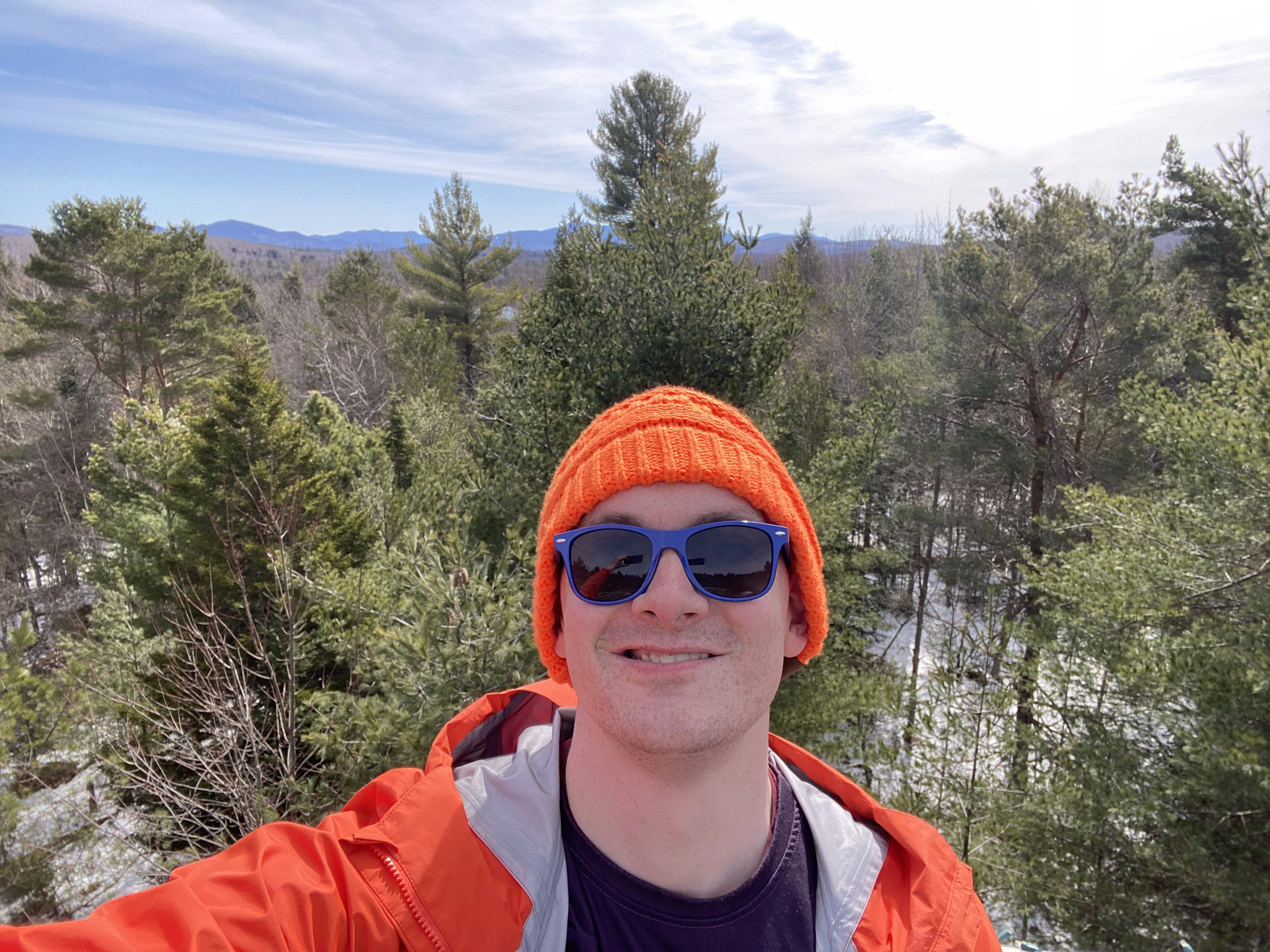 Ted with a mountain vista behind him