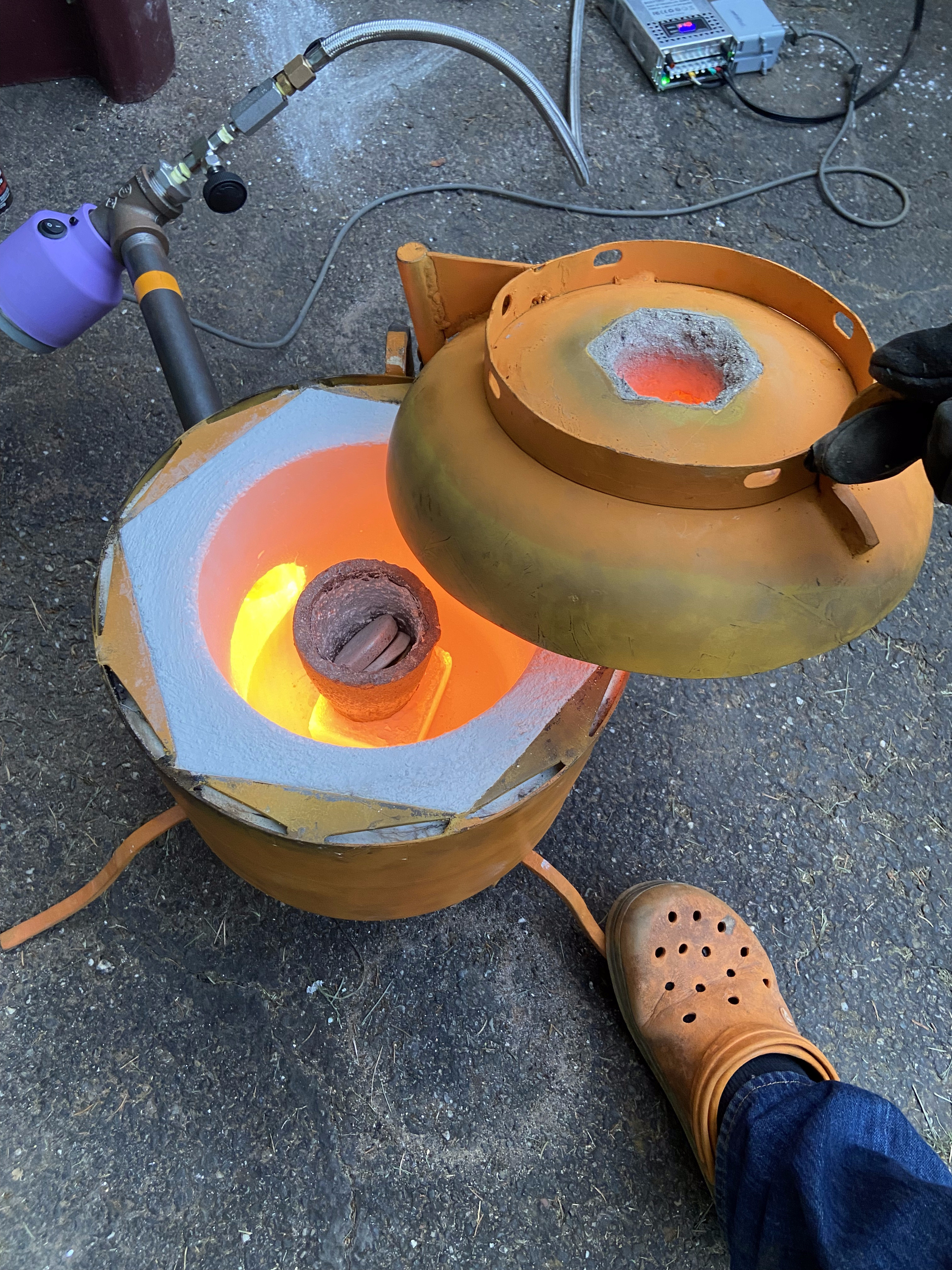 Pyrae propane furnace glowing open with molten heat inside